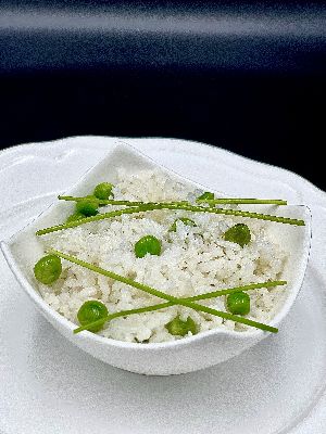 Rizi-bizi (Rice with green peas)